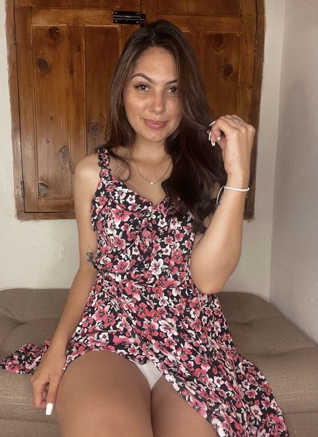 Victoria shows thong in flower dress