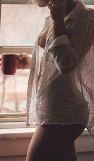 Mrs Jones casually walks through the house with her morning coffee.