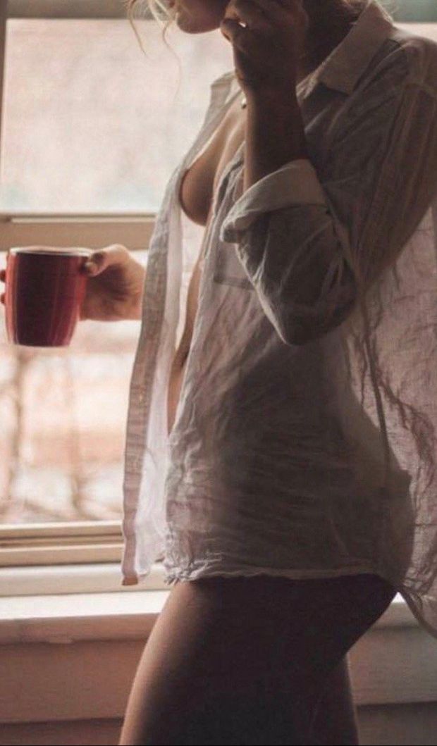 Mrs Jones casually walks through the house with her morning coffee.