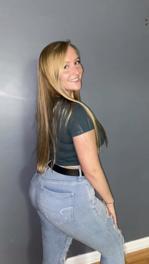 curvy blonde showing off her ass in tight jeans