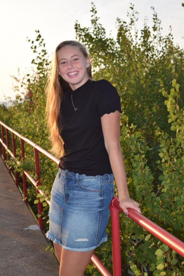 cute teen in public park