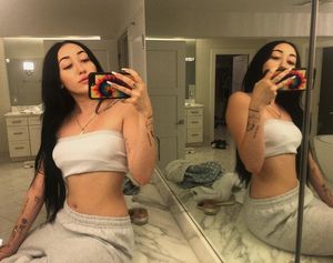 Taking sexy selfies.