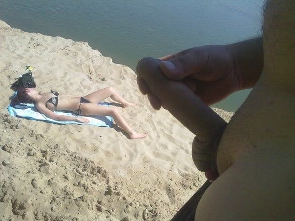 he jerks off his cock on the beach