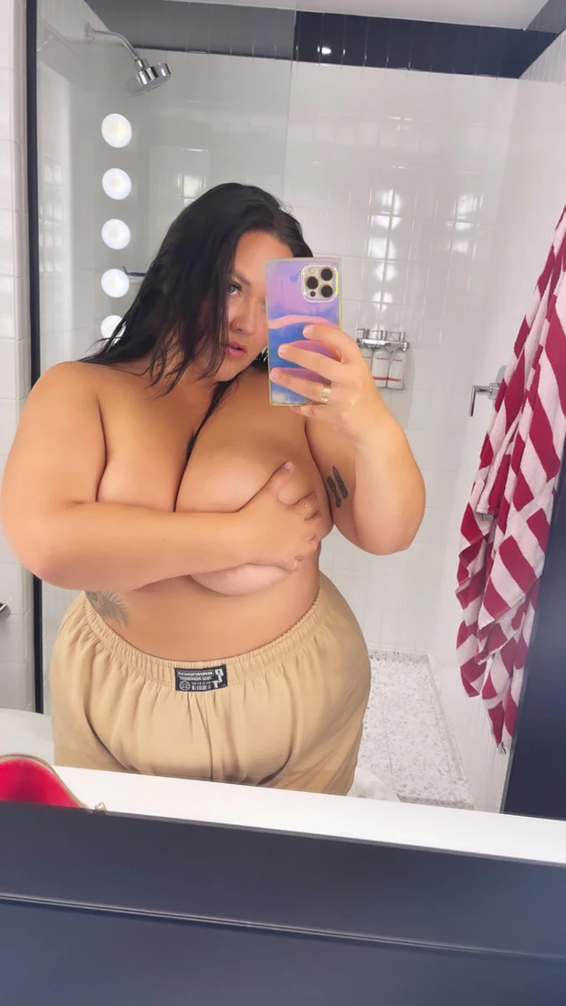 Hand Bra Selfie In Hotel Bathroom