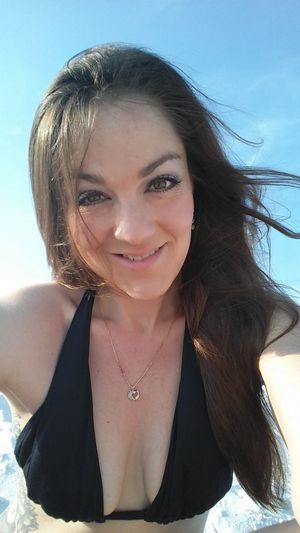 bikini top selfie at the beach