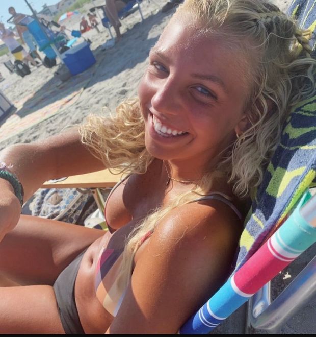 Smiling blonde beach babe