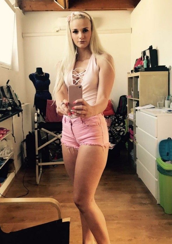 Tall blonde in pink short
