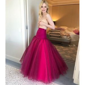 Elle Fanning covered topless