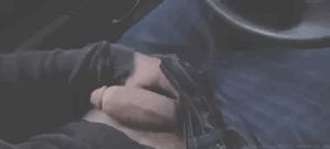 Playing with cock in car