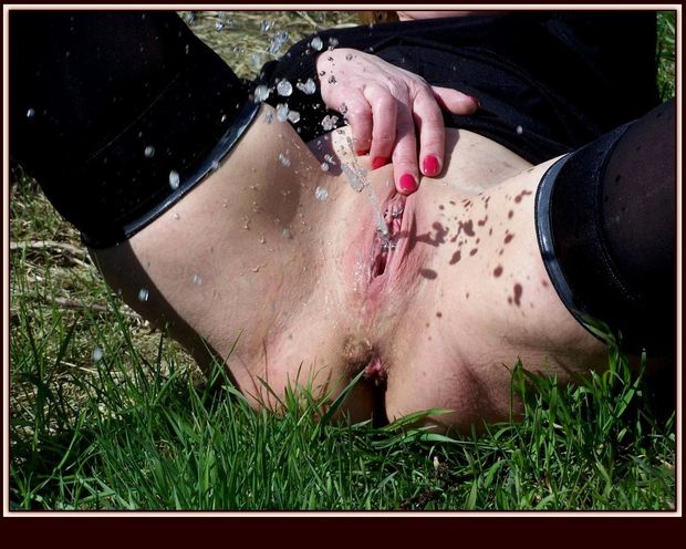 close up of pierced labia peeing