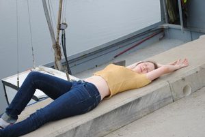 teen slut seductive pose laying down