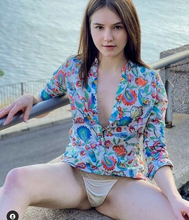 By the water