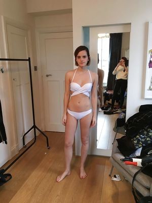 Emma Watson tries on a bikini