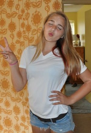 tight slut posing in jean shorts