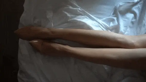 running her hands up her hot body