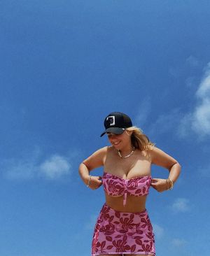 Millie gets her tits out at the beach