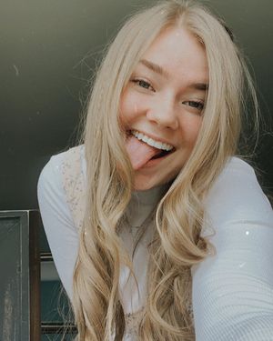 cute blonde teen selfie tongue out