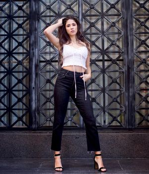 stunning slut hot pose in black pants white top