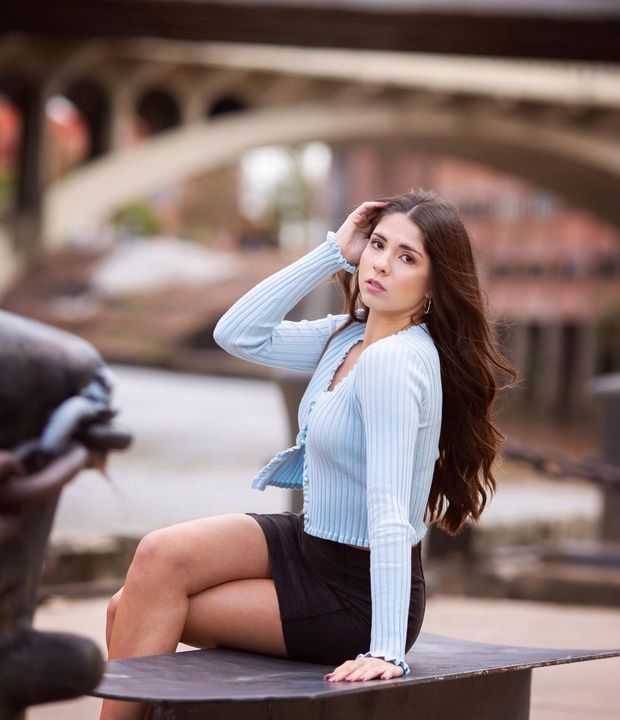 gorgeous teen black skirt legs crossed