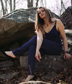 hot milf outside posing with legs crossed