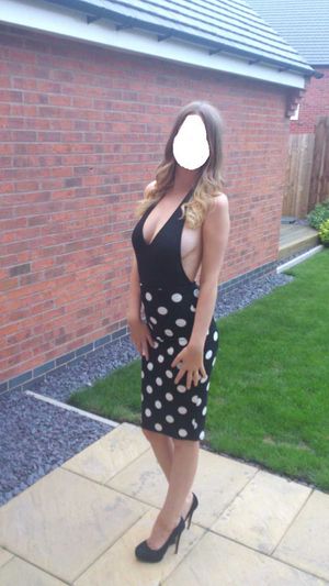 Wife goes out wearing this backless dress. Nice sideboob.