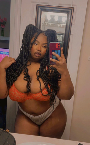 Cute Ebony BBW with locs in her bra and panties