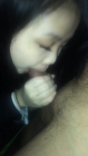 My Asian slave sucking off a stranger in a porn cinema