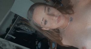 Dominating shemale sits on her man's face