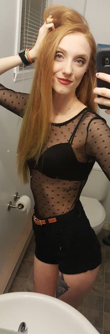 redhead slut posing in the bathroom