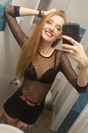 redhead slut posing in the bathroom