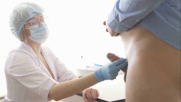 Doctor examines his penis