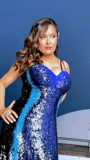 Salma's gone busty in blue.