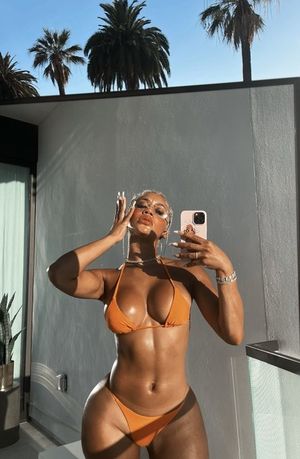 Saweetie looking sexy in a bikini