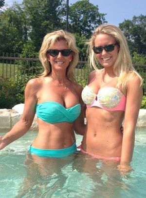 mom and daughter in pool