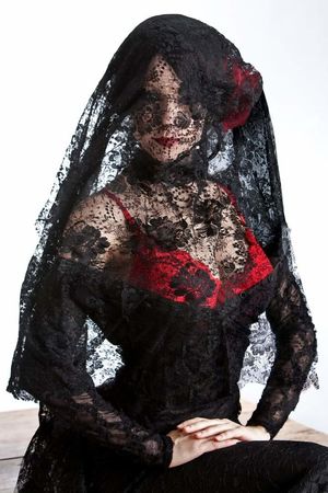 A mysterious woman appears.