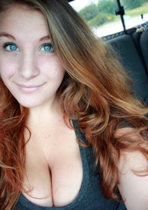 Red hair, blue eyes & huge boobs. How sexy.