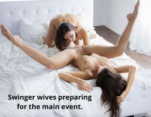 Swinger wives preparing for the main event.