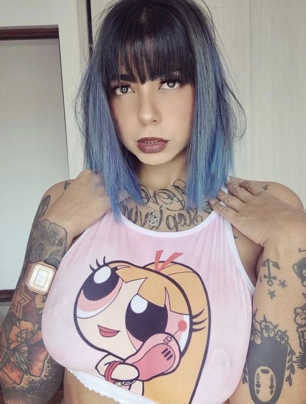 Mia Milaou visible piercings in power puff tee