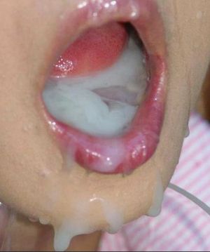 Mouth full of cum