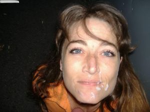 Nice brunette with cum on her face