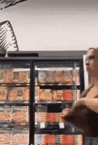 She pulls out big tits in store then sucks a nipple