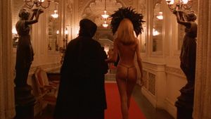 Masked lady leading her companion into a very sexy unknown - Eyes Wide Shut orgy