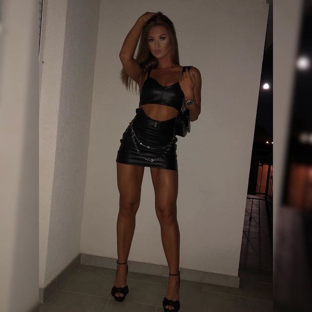 Dark hair babe in sexy outfit
