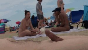 Cuck accidentally ejaculates on nude beach