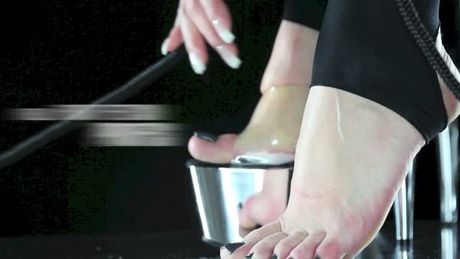 Put his tongue under her heel