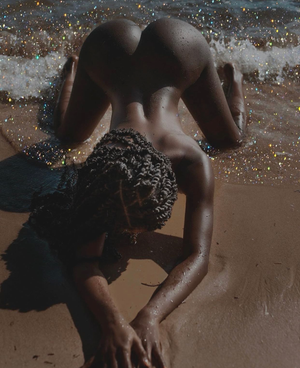 Dark skinned beauty at the beach