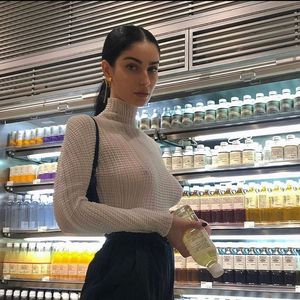 Voyeur lady in supermarket with see-through shirt