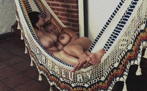 Big breasted gals in a hammock