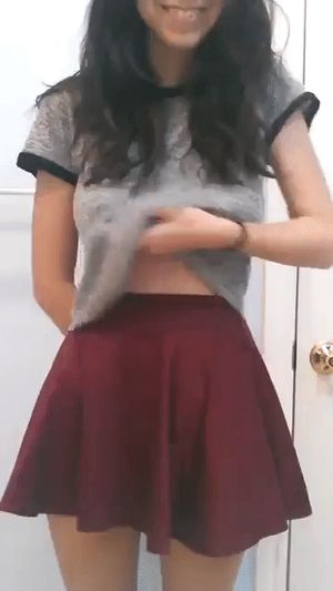 Flashing her perfect pair