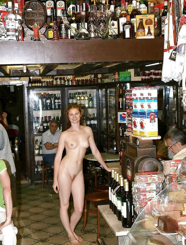 redhead nude at the bar